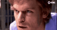 a close up of a man 's face with showtime on the bottom right