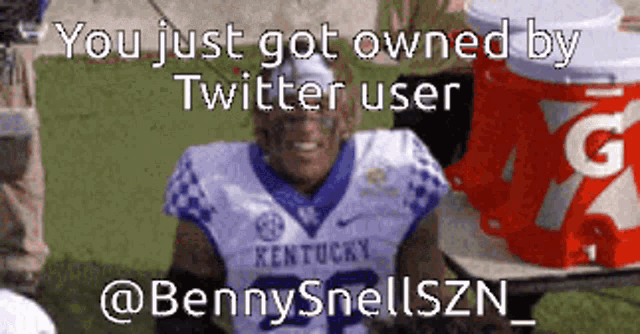 a football player with kentucky on his jersey