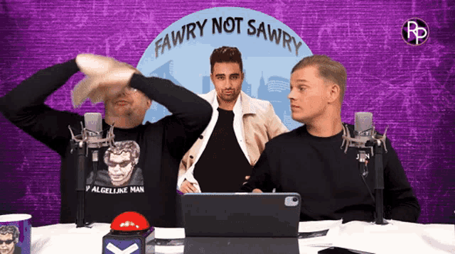 two men are sitting at a table with a sign that says fawry not sawry