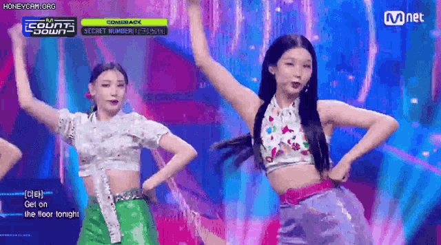 two girls are dancing on a stage with the words " get on the floor tonight " at the bottom