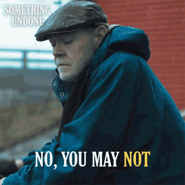 a man wearing a hat and a blue jacket says no you may not