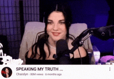 a woman is sitting in front of a microphone with a caption that says speaking my truth ..