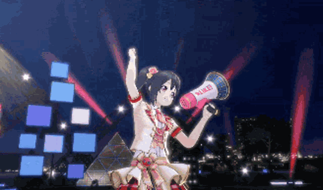 a girl is holding a megaphone that says " nico " on it