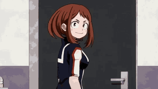 a girl is standing in front of a door in a room .