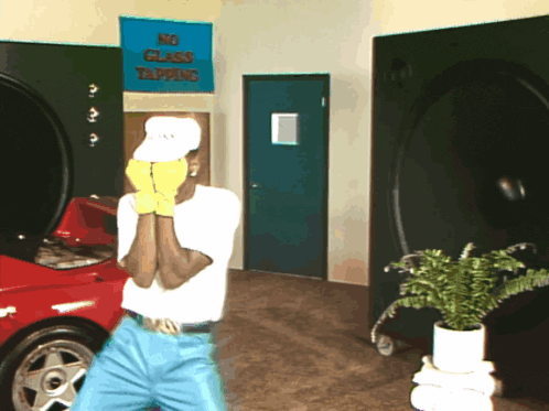 a man stands in front of a sign that says no class tapping