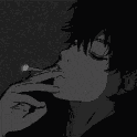 a man is smoking a cigarette in the dark .