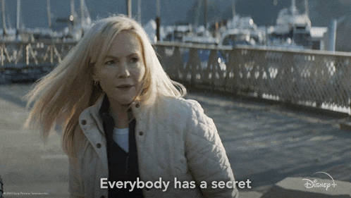 a woman says everybody has a secret in a disney+ ad