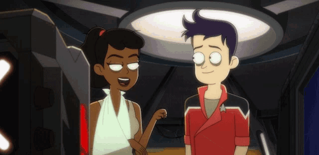 a man and a woman standing next to each other