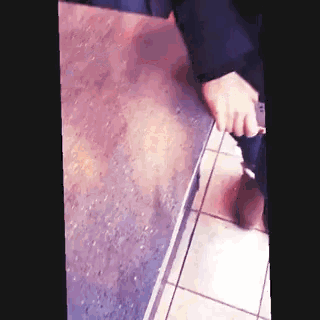 a blurred image of a person standing on a table