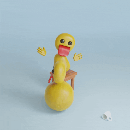 a yellow smiley face with its tongue hanging out