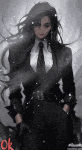 a woman with long hair wearing a suit and tie