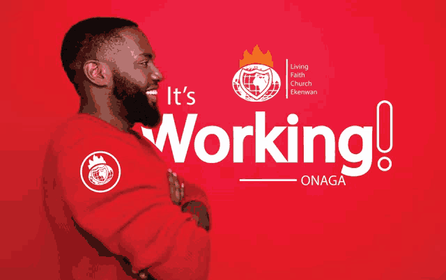 a man in a red sweater is standing in front of a red background that says it 's working