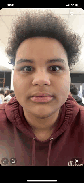 a screenshot of a person 's face with the time 9:50