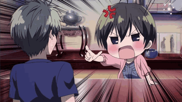 a boy and a girl are having an argument and the girl is pointing at the boy