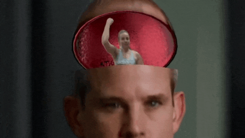 a man 's head has a picture of a woman in an adidas shirt coming out of it