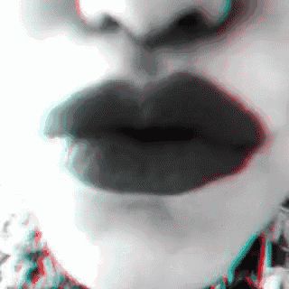a close up of a woman 's lips with red and blue lines
