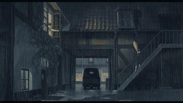 a car is parked in a garage under a building in the rain