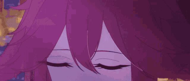 a close up of a girl 's face with pink hair and blue eyes .