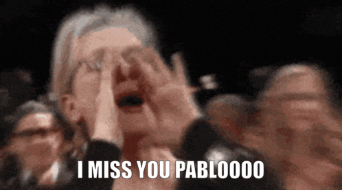 a woman is crying in a crowd and the words i miss you pabloooo are visible