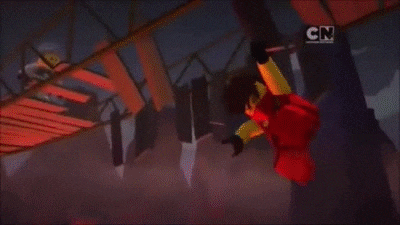 a cartoon character is standing in front of a large fireball in the dark .