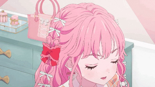 a girl with pink hair and a bow in her hair