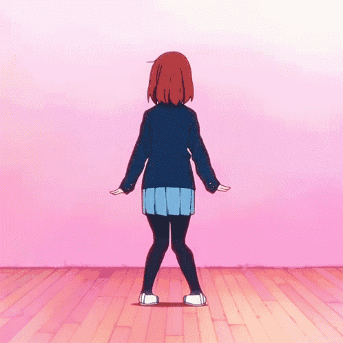 a girl with red hair is standing on a wooden floor with her arms outstretched