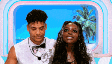 a man and a woman are standing next to each other with their faces covered in foam