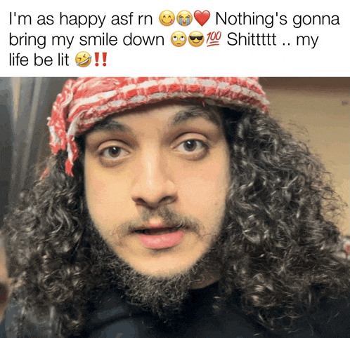 a picture of a man with curly hair and a caption that says " nothing 's gonna bring my smile down "