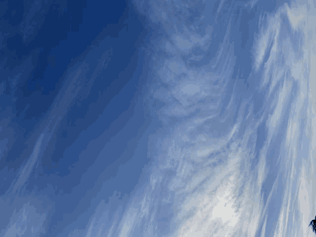 a blue sky with a few clouds in it