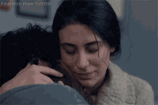 a woman hugging a man with fearless-man.tumblr written on the bottom right