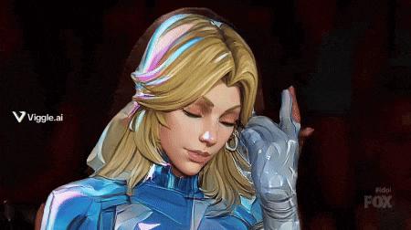 a woman in a superhero costume is giving the middle finger with a fox logo in the background