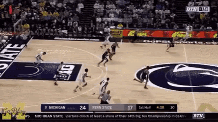 a basketball game is being played between penn state and michigan