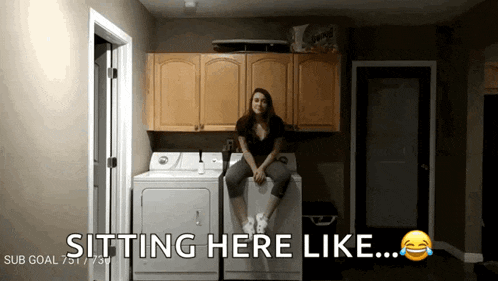 a woman sits on a washer and dryer in a laundry room with the words sitting here like below her