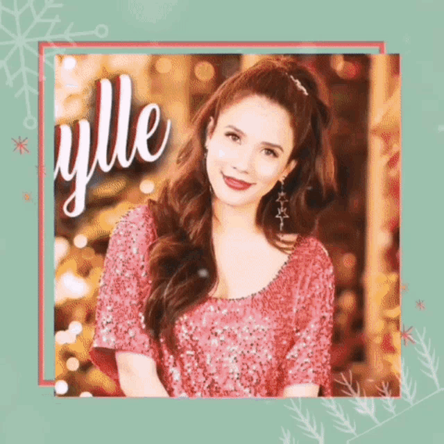 a picture of a woman in a pink dress with the word ylle written on it
