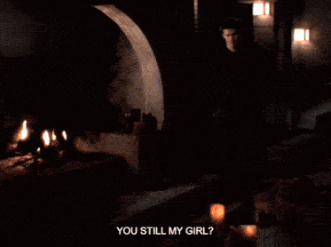 a woman says " you still my girl " while standing in the dark
