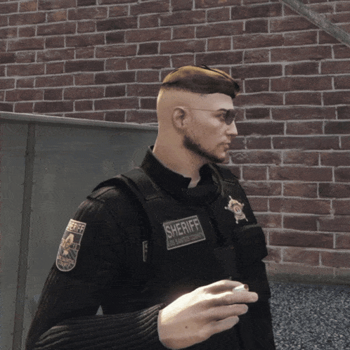 a man in a police uniform is smoking a cigarette in front of a brick wall with the word cinema on it