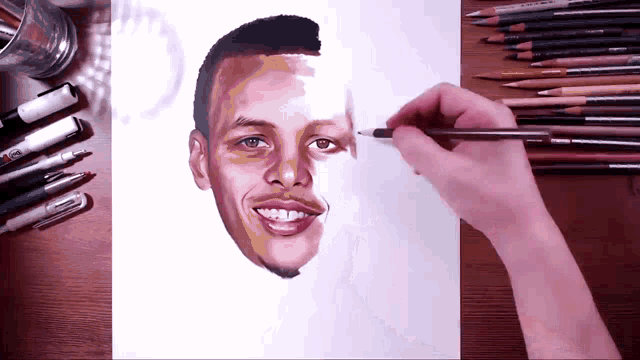 a person is drawing a picture of a man 's face with colored pencils