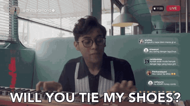 a man playing a keyboard with the words " will you tie my shoes " below him