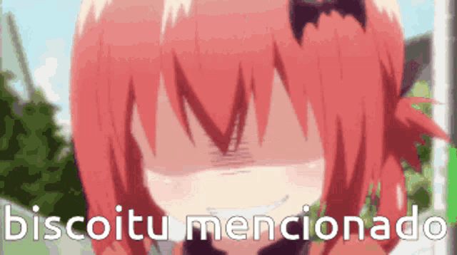a close up of a girl with red hair and the words biscoitu mencionado behind her