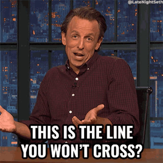 a man sitting at a table says this is the line you won t cross