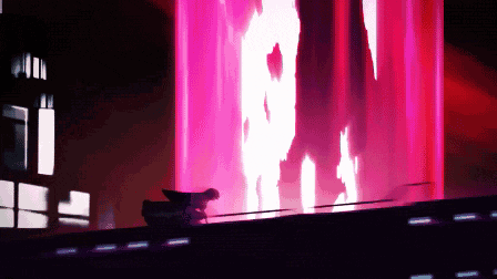 a car is driving down a road in front of a purple screen