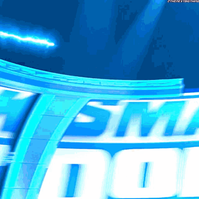 a blue and white sign that says ' smack down ' on it
