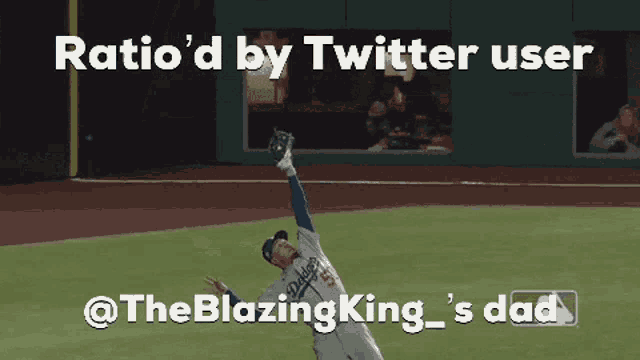 a baseball player with the number 50 on his jersey is catching a ball