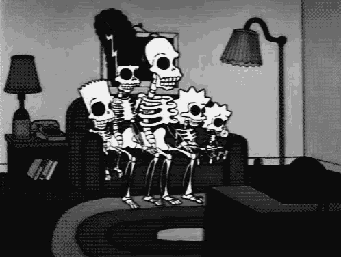 the skeletons of the simpsons are sitting on a couch .