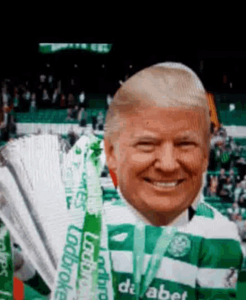a man wearing a green and white striped shirt that says dafabet on it