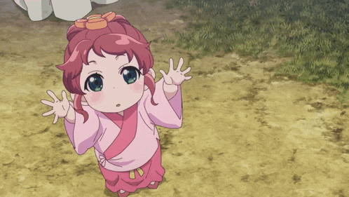 a little girl in a pink kimono is standing on a dirt road