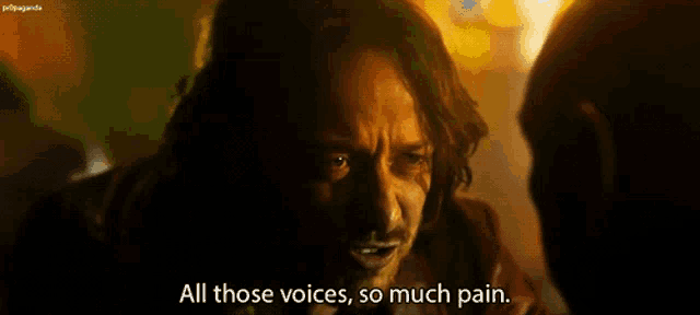 a man says all those voices so much pain in a dark room