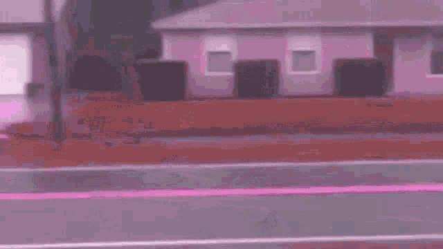 a pixel art of a person walking down a street with a flag