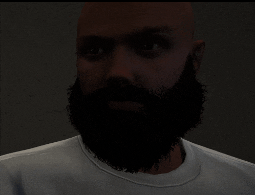 a man with a beard is wearing a white t-shirt