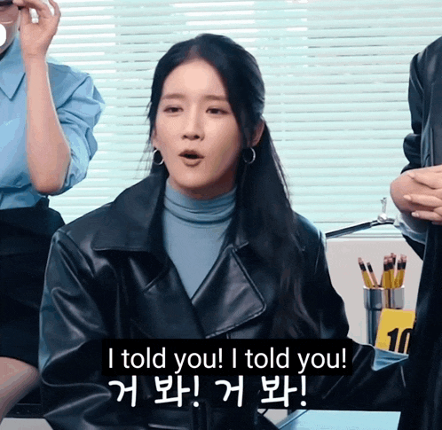 a woman in a black leather jacket says " i told you "